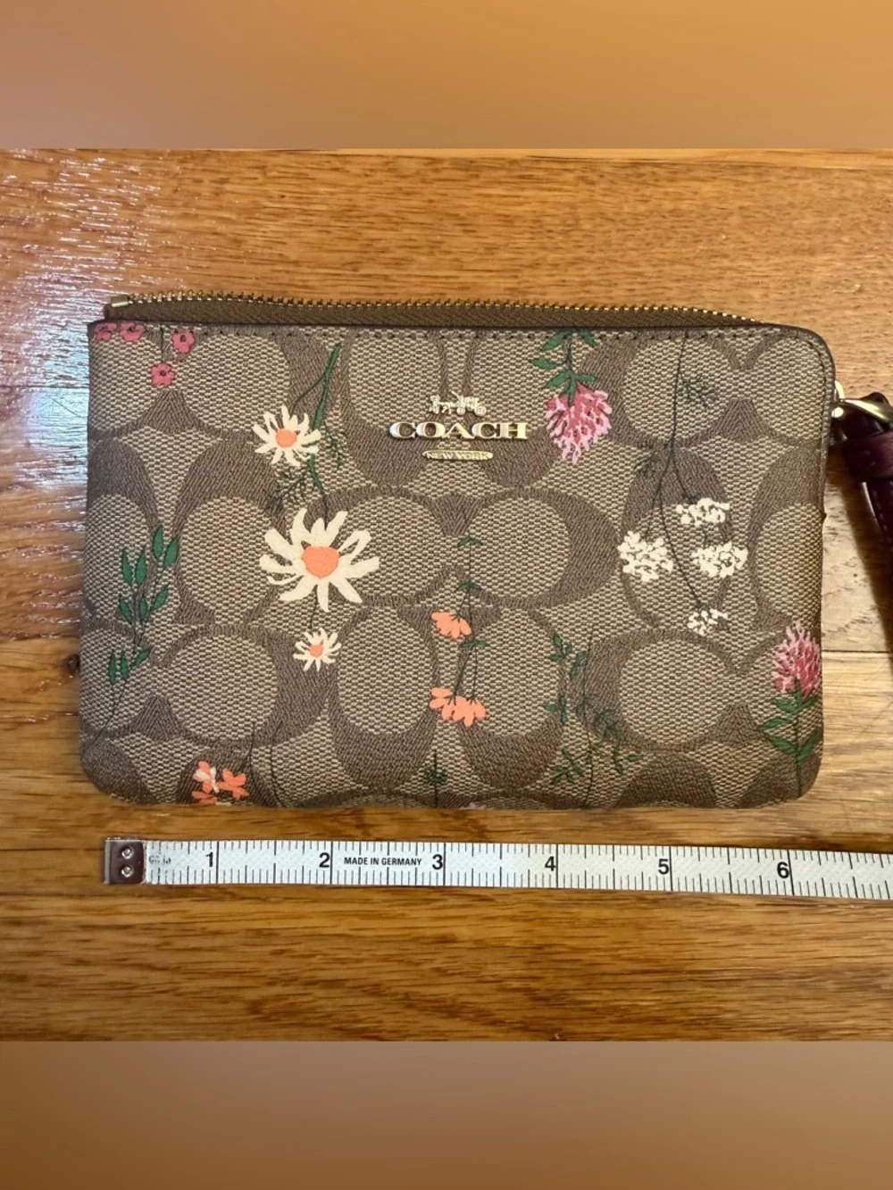 Coach Corner Zip Wristlet In Signature Canvas With Wildflower Print